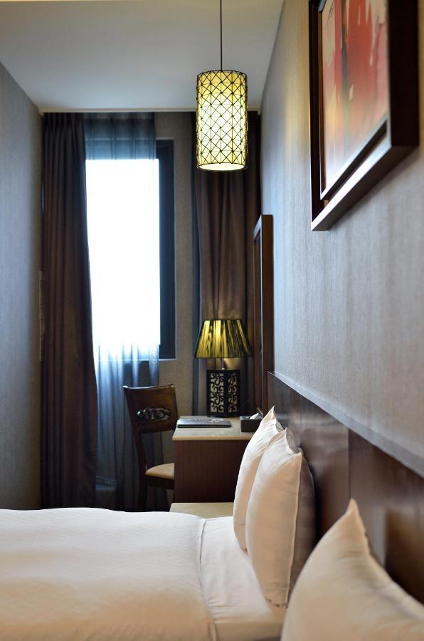 Guanko Hotel Цзяи Экстерьер фото